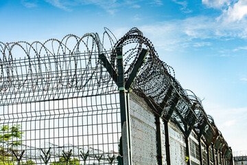 Airport barbed wire fence, barbed wire