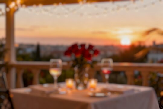 Blur image of romantic outdoor dinning table. Valentine day - Powered by Adobe