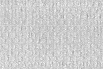 Bubble wrap texture providing plastic packaging protection background.