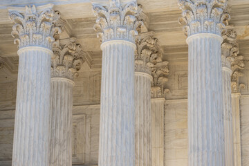 Fototapeta premium Government building with timeless architecture. Court house exterior with elegant columns. Historic structure showing monumental design. Architecture shaped by strong stone columns.