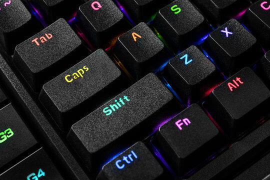 Close-up of RGB gaming keyboard - Tab, Caps and Shift keys. - Powered by Adobe