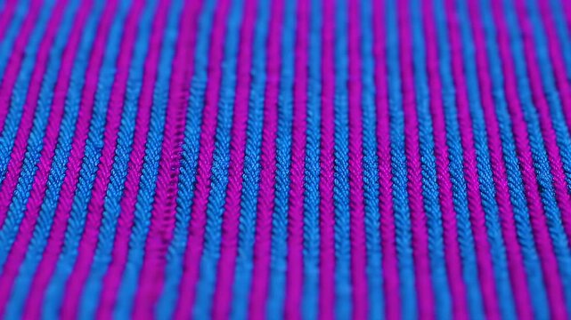 Striking Blue and Magenta Striped Fabric Texture with Parallel Lines and Shallow Depth