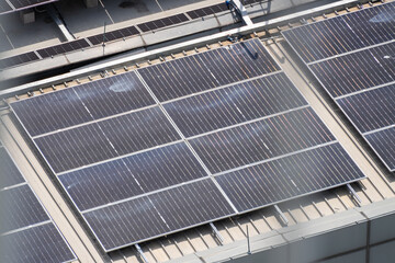 Aerial view of urban rooftop solar panel installation sustainable energy in industrial settings