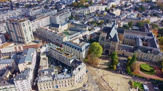 Aerial view of Le Mans cityscape, France, featuring Pr&eacute;fecture de la Sarthe administrative classic building adjoining Saint-Julien Cathedral surrounded by residential and commercial urban blocks