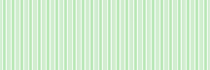 Light green and white vertical stripes seamless pattern. A gentle, crisp background perfect for spring, Easter, christmas, decor, and digital design projects.