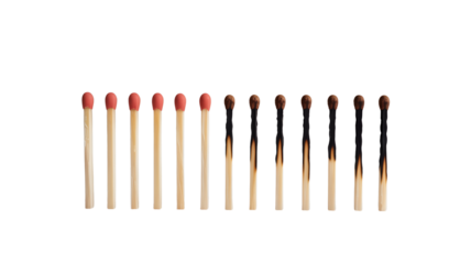 Row of unburnt and burnt matches isolated on transparent background