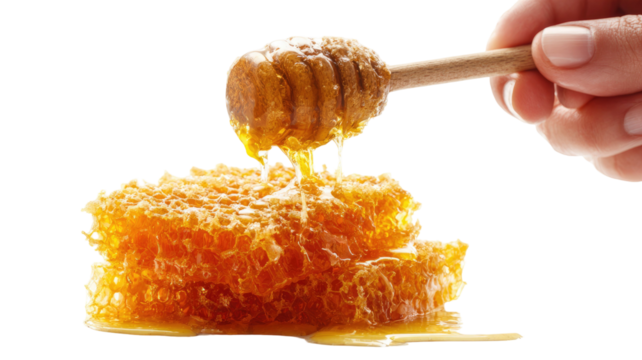 Golden honey with natural honeycomb pieces showcasing rich texture and sweet organic appearance perfect for food display isolated on white background