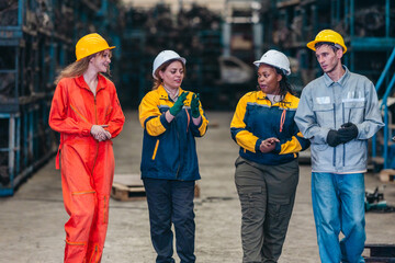 Factory Crew Talking During Break in Warehouse