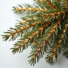 Close-up of a festive pine branch adorned with shimmering metallic gold glitter, evoking the joyful spirit and decorative beauty of the Christmas holiday season