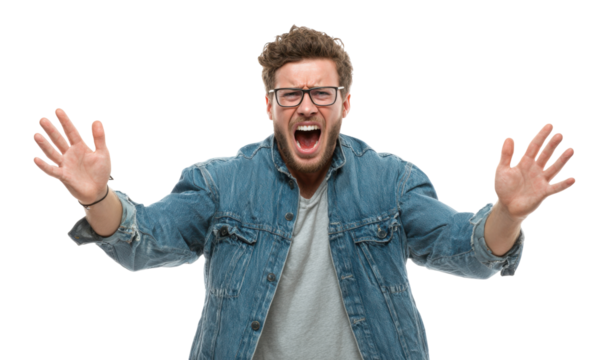 Man with glasses and denim jacket screaming with open mouth and raised hands.