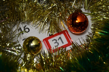 December 31st on the calendar and New Year's tree decorations