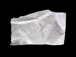 Torn paper piece isolated on a black background. White textured ripped paper strip.