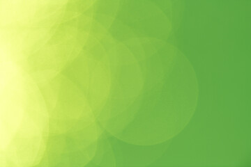 黄緑色の背景の玉ボケ