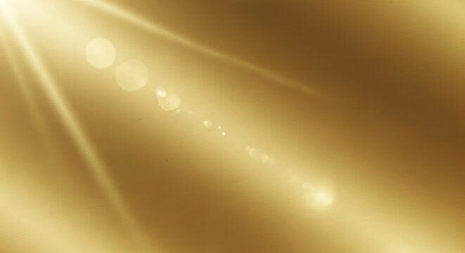 Golden rays of light on a gold background. The concept of a golden light effect.