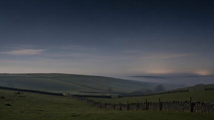 A rural landscape with rolling green hills under a cloudy sky, divided by a stone fence.