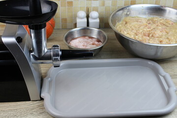 Preparing a meat grinder for making homemade sausage