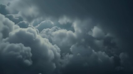 Expansive view of a dense, dark cloud formation filling the sky, creating a powerful and moody atmospheric backdrop before an impending weather event