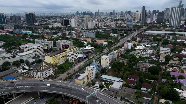 Aerial Pan Across the Sprawling Residential and Commercial Skyline of Bang Kapi district in Bangkok