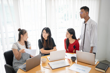 Obraz premium Business people group diverse colleagues team discuss project in bright modern office Startup Diversity Teamwork Brainstorming.