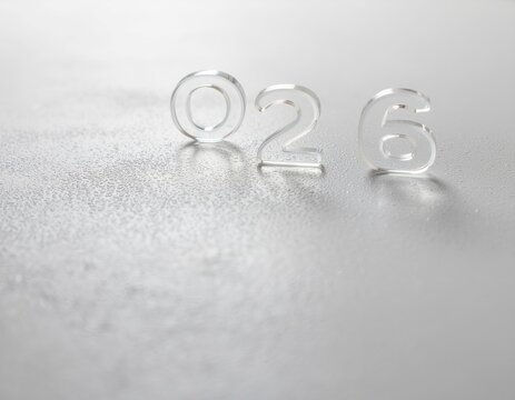 Clear digits "026" stand on a textured, bright surface