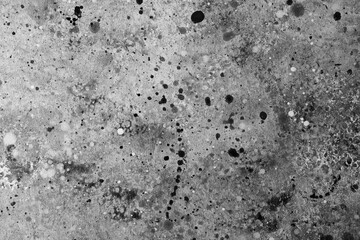 Unique abstract artwork created with ink splatters in black and white tones