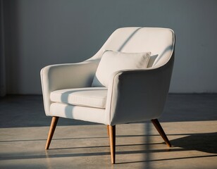 White armchair casting shadows on sleek gray floor