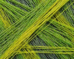 Intertwined Green And Yellow Threads
