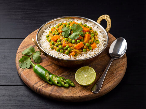 Indian Rice Biryani chicken and vegetable with lemon and green pepper
