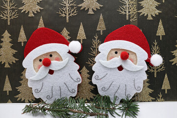 2 têtes souriantes du père noël