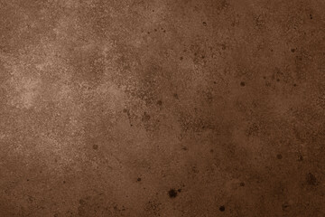 Brown aged textured wall with vintage concrete effect and spots