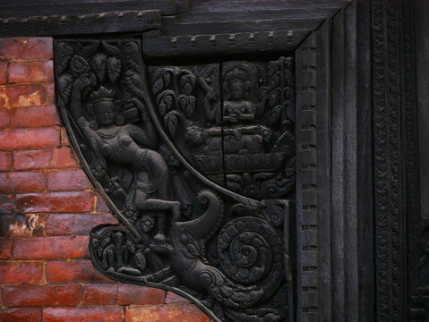 Wooden architectural design of door or Wooden Carving on Temple door from Bhaktapur  Durbar Square UNESCO Site, Nepal.