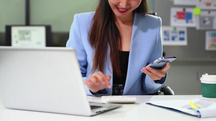 Businesswoman hand working digital marketing media in virtual screen with mobile phone and modern compute in office - Powered by Adobe