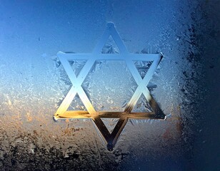 Star of David carved into a frosty window symbolizing light and spirituality during winter