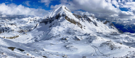 Beautiful view on snowy mountain range and ski slope in Austria Alps, Obertauern at winter