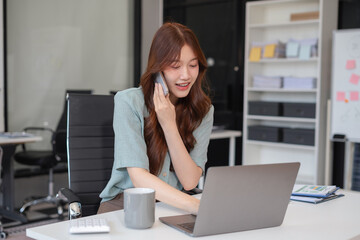Email notification concept, Female use smartphone and laptop receive message alert in the mailbox.