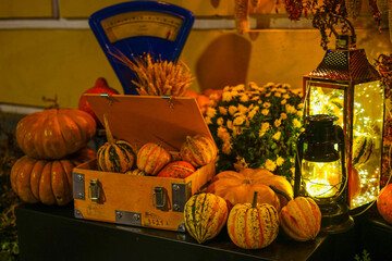 Autumn Harvest Display with Pumpkins and Lanterns