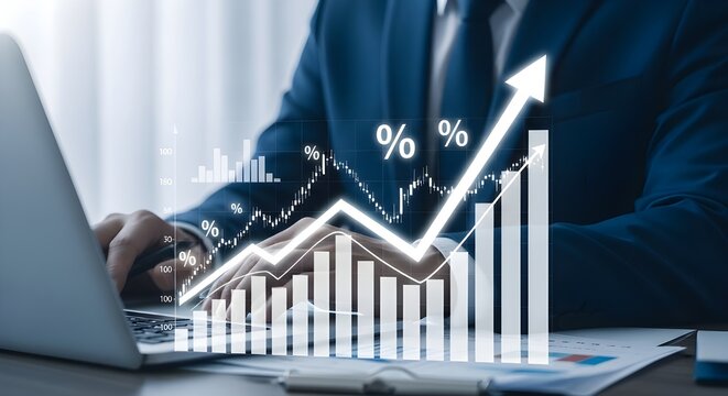 Business growth and financial success man analyzes data on laptop with rising graph - Powered by Adobe