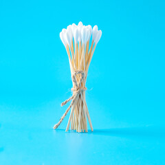 A swab clean health care top view,cotton bud on blue background.