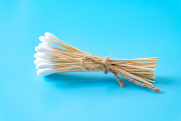 A swab clean health care top view,cotton bud on blue background.