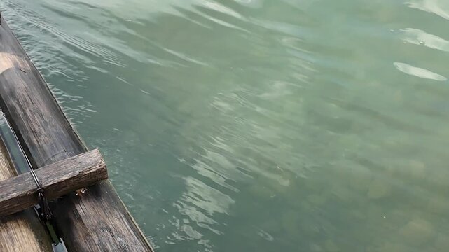 Bamboo Raft on Tranquil Waters - Relaxing River Adventure - Powered by Adobe