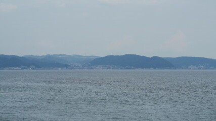 The beautiful sea view with the cloudy sky as background in summer