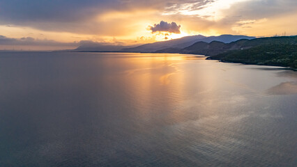 Fototapeta premium Aerial Drone View of Sunset over Gulf of Corinth, Central Greece, viewed from Skaloma
