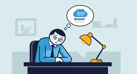 A tired man suffers from the Monday blues at his desk