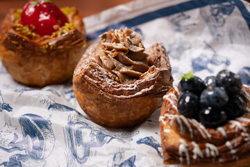 Flaky pastry topped with hazelnut cream and powder.