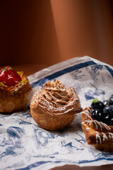 Flaky pastry topped with hazelnut cream and powder.