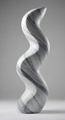Naklejka premium A tall smooth abstract sculpture of white marble with gray veins in a serpentine Scurve shape on a light gray background
