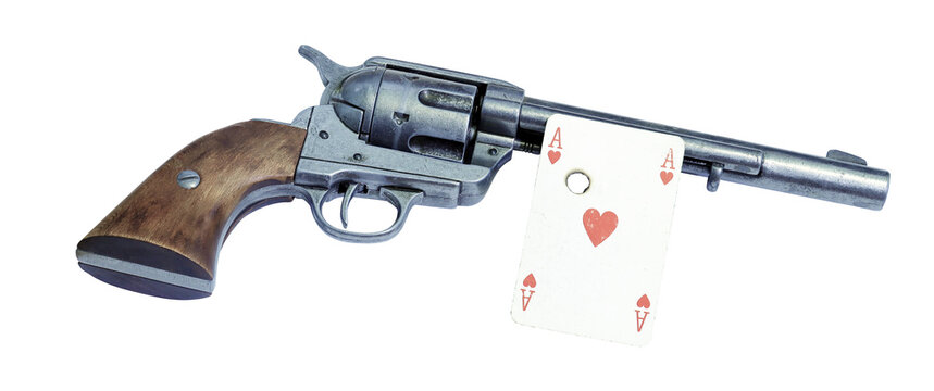 old west revolver and ace of hearts playing card with bullet hole  isolated on transparent background