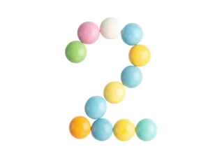 Number two made of pastel-colored candy balls