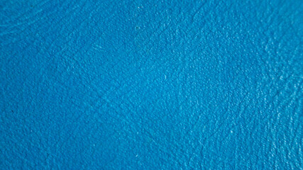 Authentic blue leather surface in high-detail close-up. mereya
