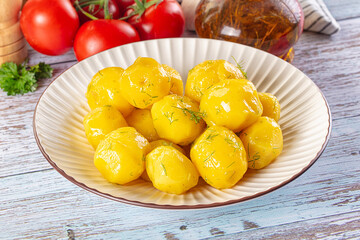 Boiled young potato with oil